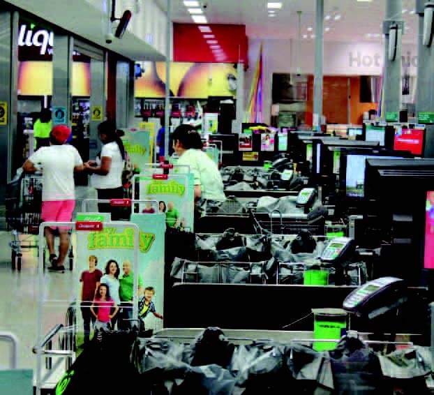 photo of line of many cash registers for checkout